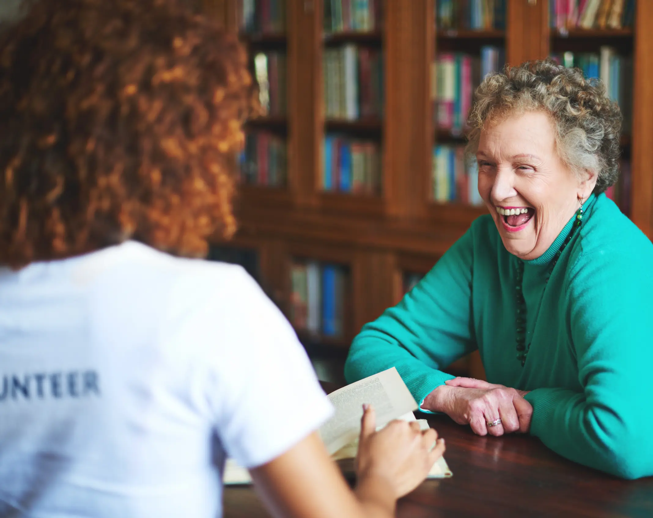 Two women having a lively and fun conversation